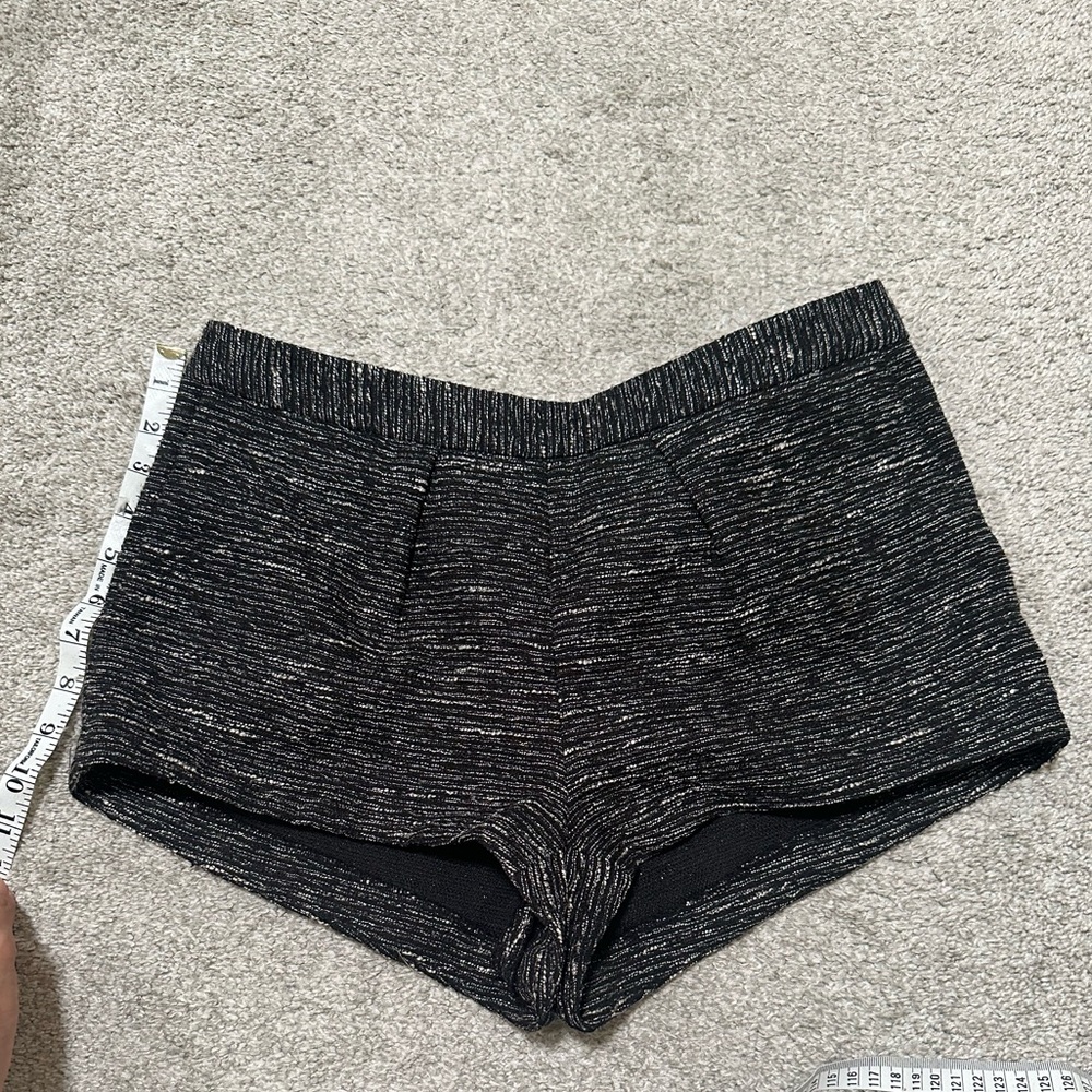 Aritzia Talula shimmery black shorts with pockets